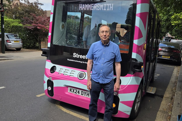 Andy Slaughter with one of the autonomous electronic pods which could be used to cross Hammersmith Bridge 