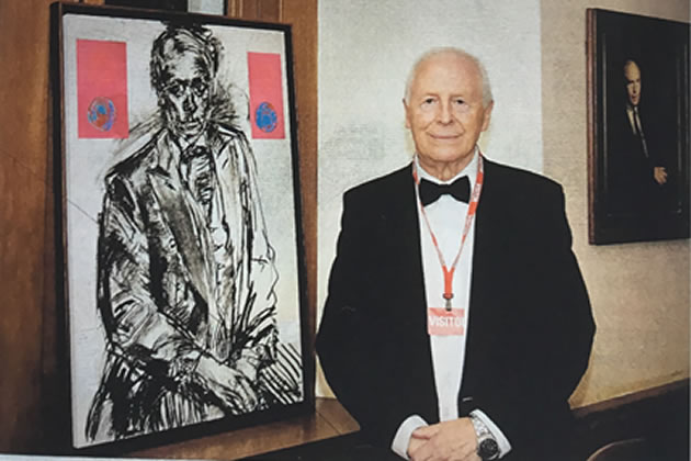 Barry Martin with his portrait of Tony Buzan 