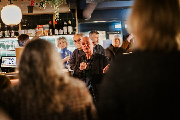 Torin Douglas addresses the room