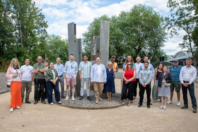 The project team, volunteers, councillor and residents gather for the launch