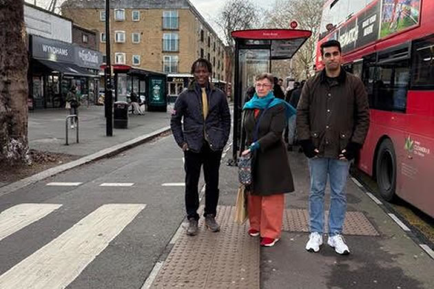 Cllrs Ron Mushiso, Joanna Biddolph and Vickram Grewal at a floating bus stop on Chiswick High Road
