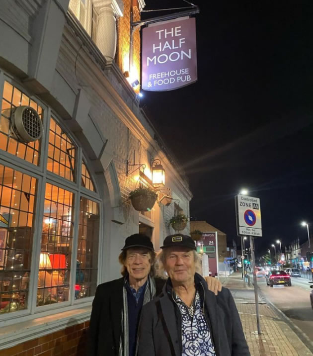 Mick Jagger with his brother Chris outside The Half Moon
