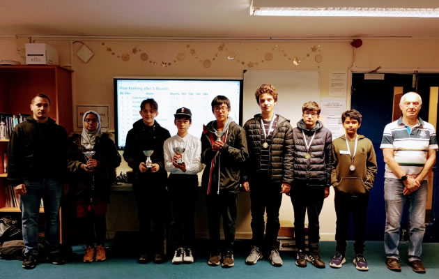 The prize winners with Mr D’Costa (left) and Dr Rowden (right)